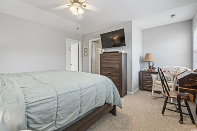 This spacious five-bedroom, four-bathroom raised beach home is