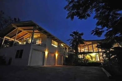 Enter via a gated Palm Tree lined drive to a dramatic custom - photo 2