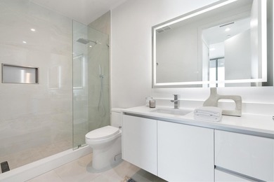 This gorgeous new construction waterfront condo offers bright - photo 13