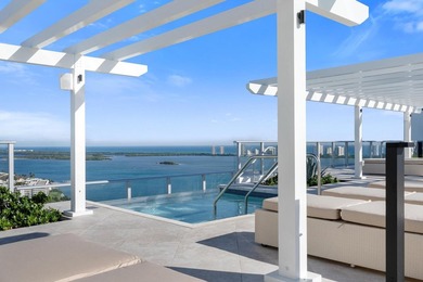 This gorgeous new construction waterfront condo offers bright - photo 21