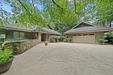 Welcome to a waterfront sanctuary nestled among the trees in the - photo 2