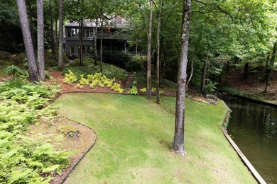 Welcome to a waterfront sanctuary nestled among the trees in the - photo 4