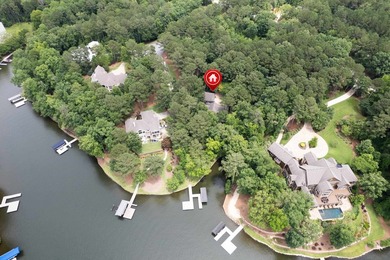 Welcome to a waterfront sanctuary nestled among the trees in the - photo 9