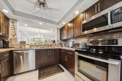 JUST REDUCED!! Beautiful renovated 3 bedroom corner condo with - photo 9