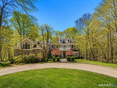 Beautifully rebuilt in 2006, this custom turn-key retreat offers - photo 1