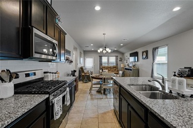 Well-maintained 2022 DR Horton home that is move-in ready and - photo 4