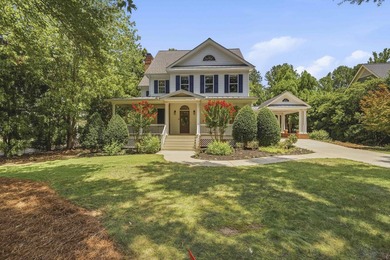 Nestled within the coveted Parkside enclave of Cuscowilla on - photo 1