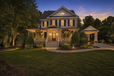 Nestled within the coveted Parkside enclave of Cuscowilla on - photo 3