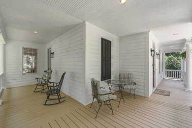 Nestled within the coveted Parkside enclave of Cuscowilla on - photo 7