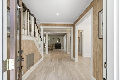 Nestled within the coveted Parkside enclave of Cuscowilla on - photo 8
