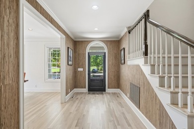 Nestled within the coveted Parkside enclave of Cuscowilla on - photo 9
