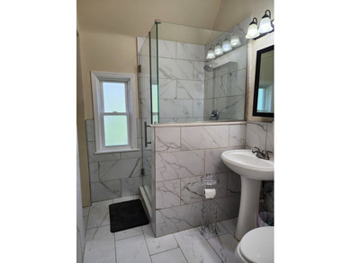 Welcome to this beautifully renovated Victorian home overlooking - photo 11