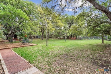 Tucked away on over 2 peaceful acres in the sought-after Woods - photo 35