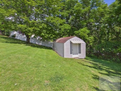 Welcome to this spacious and well maintained brick ranch home - photo 11