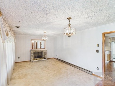 Welcome to this spacious and well maintained brick ranch home - photo 12