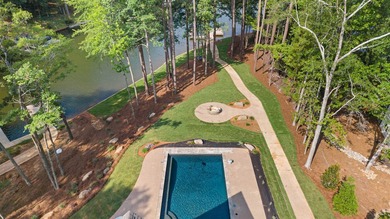 The Hearth is a waterfront home designed around the moments that - photo 2