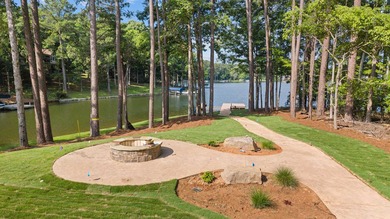 The Hearth is a waterfront home designed around the moments that - photo 3