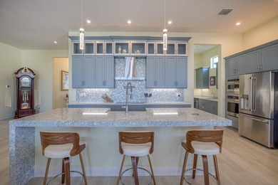 Welcome to elevated Florida luxury living in PGA Verano, one of - photo 13