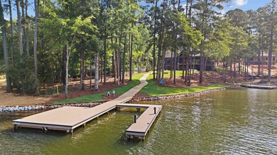 The Hearth is a waterfront home designed around the moments that - photo 5