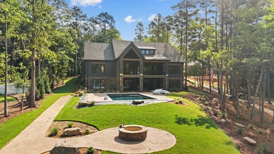 The Hearth is a waterfront home designed around the moments that - photo 6
