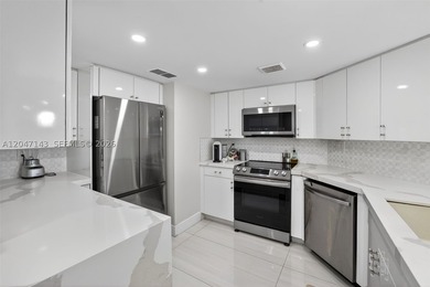 Mesmerizing views from this FULLY RENOVATED corner unit with - photo 18