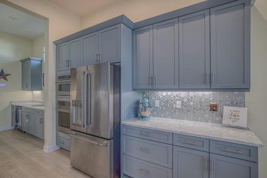 Welcome to elevated Florida luxury living in PGA Verano, one of - photo 18