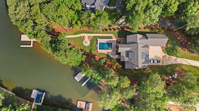 The Hearth is a waterfront home designed around the moments that - photo 9