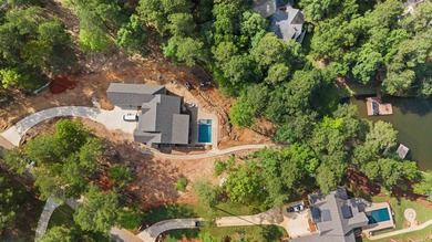 The Hearth is a waterfront home designed around the moments that - photo 10