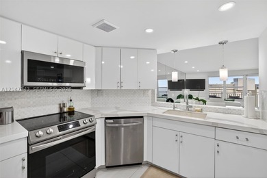 Mesmerizing views from this FULLY RENOVATED corner unit with - photo 20