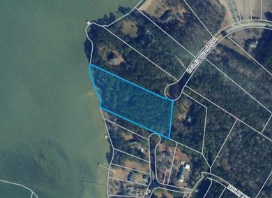 Welcome to the last buildable waterfront lot in an established - photo 8