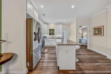 Welcome to this charming 3-bedroom, 2.5-bathroom townhome - photo 12
