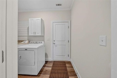 Welcome to this charming 3-bedroom, 2.5-bathroom townhome - photo 18