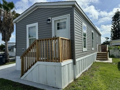 Make your new home in Palm Haven SP, a well-maintained - photo 3