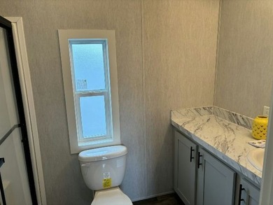 Make your new home in Palm Haven SP, a well-maintained - photo 5