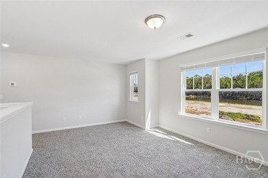 The Magnolia floorplan by Smith Family Homes is under - photo 17