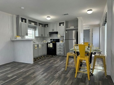 Make your new home in Palm Haven SP, a well-maintained - photo 7