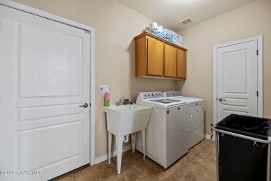 Welcome to this beautifully maintained 2,002 sq ft home nestled