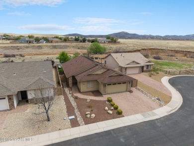 Welcome to this beautifully maintained 2,002 sq ft home nestled