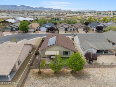 Welcome to this beautifully maintained 2,002 sq ft home nestled