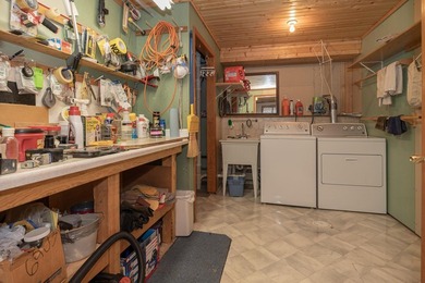 Woman Lake living begins with 150 feet of shoreline, a sandy - photo 35