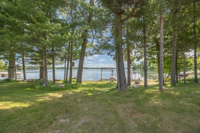 Woman Lake living begins with 150 feet of shoreline, a sandy - photo 36