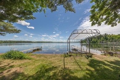Woman Lake living begins with 150 feet of shoreline, a sandy - photo 37