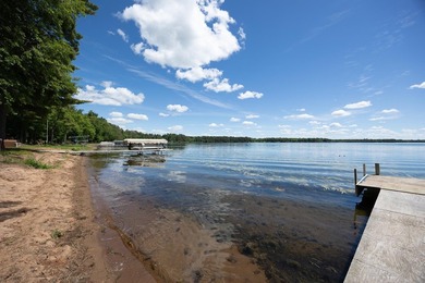 Woman Lake living begins with 150 feet of shoreline, a sandy - photo 39