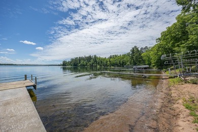 Woman Lake living begins with 150 feet of shoreline, a sandy - photo 40