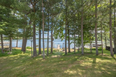 Woman Lake living begins with 150 feet of shoreline, a sandy - photo 43