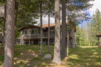Woman Lake living begins with 150 feet of shoreline, a sandy - photo 47