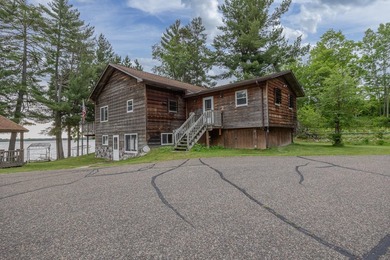 Woman Lake living begins with 150 feet of shoreline, a sandy - photo 48