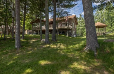 Woman Lake living begins with 150 feet of shoreline, a sandy - photo 49