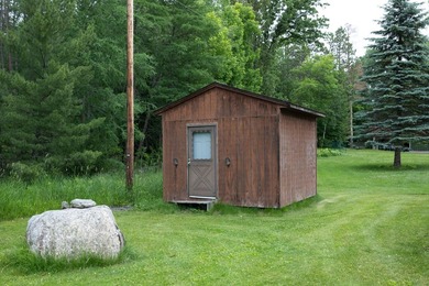 Woman Lake living begins with 150 feet of shoreline, a sandy - photo 50