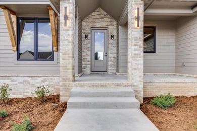 MODEL IS NOW FOR SALE! Stunning 5 Bedroom, 3 Bath Lakefront Home - photo 2